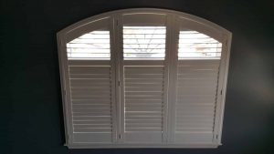 What Is the Difference Between Roman Shades and Plantation Shutters?
