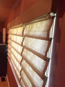 What Is the Difference Between Roman Shades and Plantation Shutters?